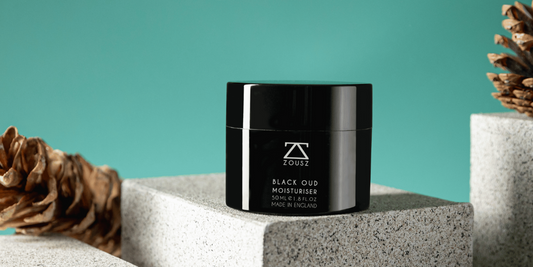 Moisturiser sitting on some stone with acorns and leaves