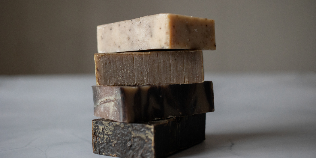 4 different soaps on stacked on top of each other