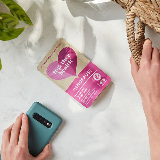 Plant, Ladies Basket, Hands holding a phone and a packet of tablets.