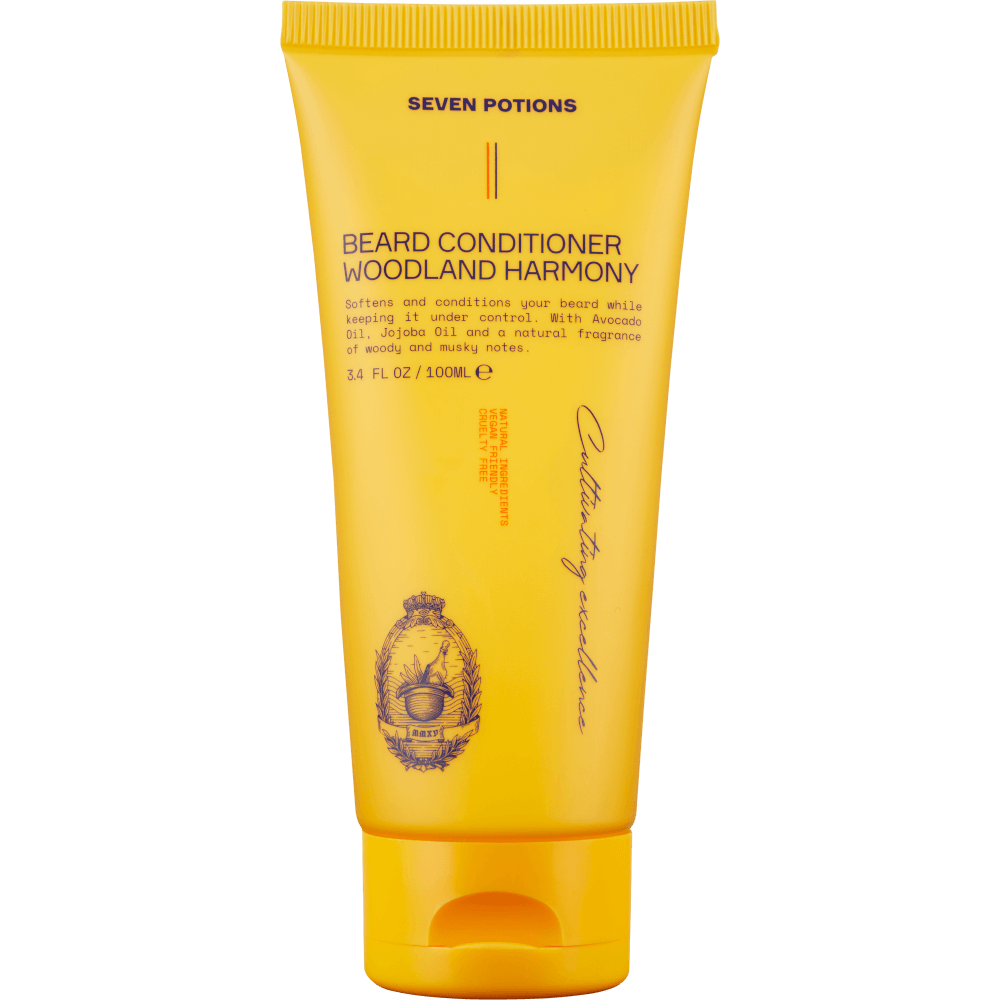 Yellow tube of Seven Potions Beard Conditioner on a black background