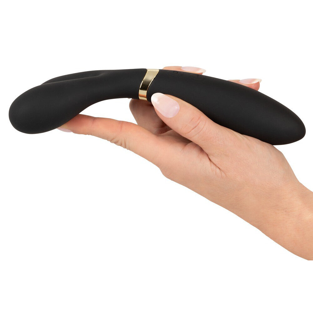 hand holding Black Couples Vibrator on white background. image 3