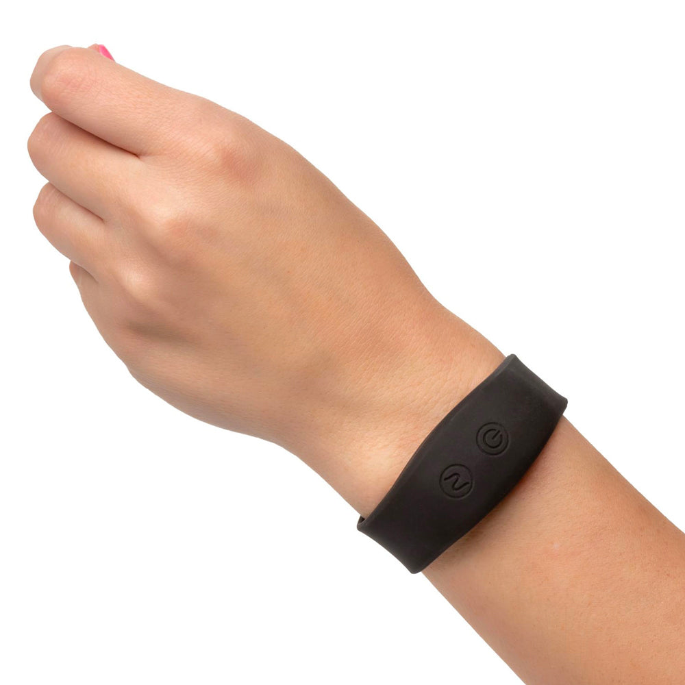 watch on wrist Black Petite Wristband Remote Bullet on white background. image 3