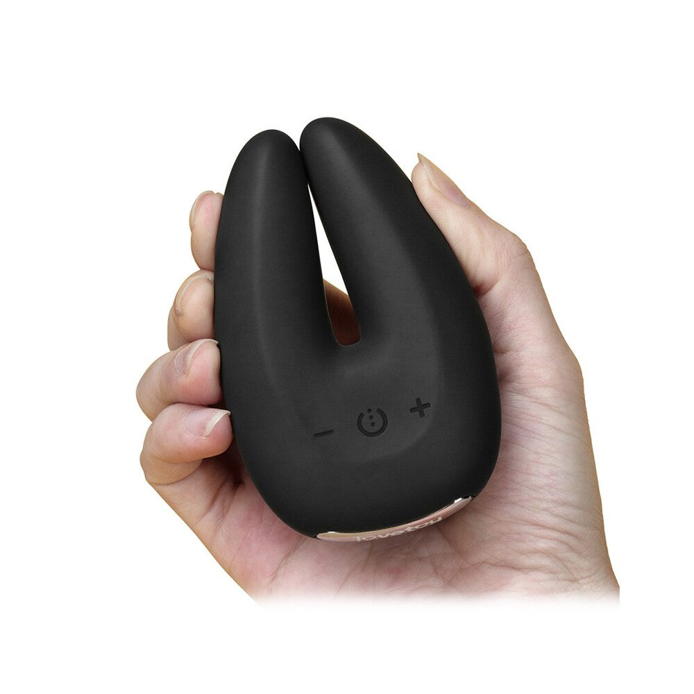 hand holding Black Rapture Twin Vibrator on white background. image 3