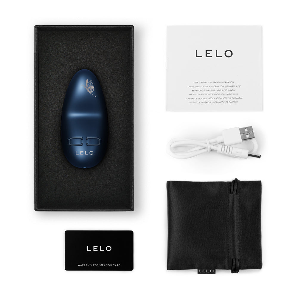 Blue Petite Personal Massager with charger on white background. image 3
