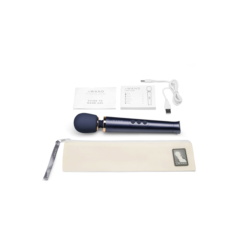 Blue Petite Rechargeable Vibrating Wand with charger and bag on white background. image 3
