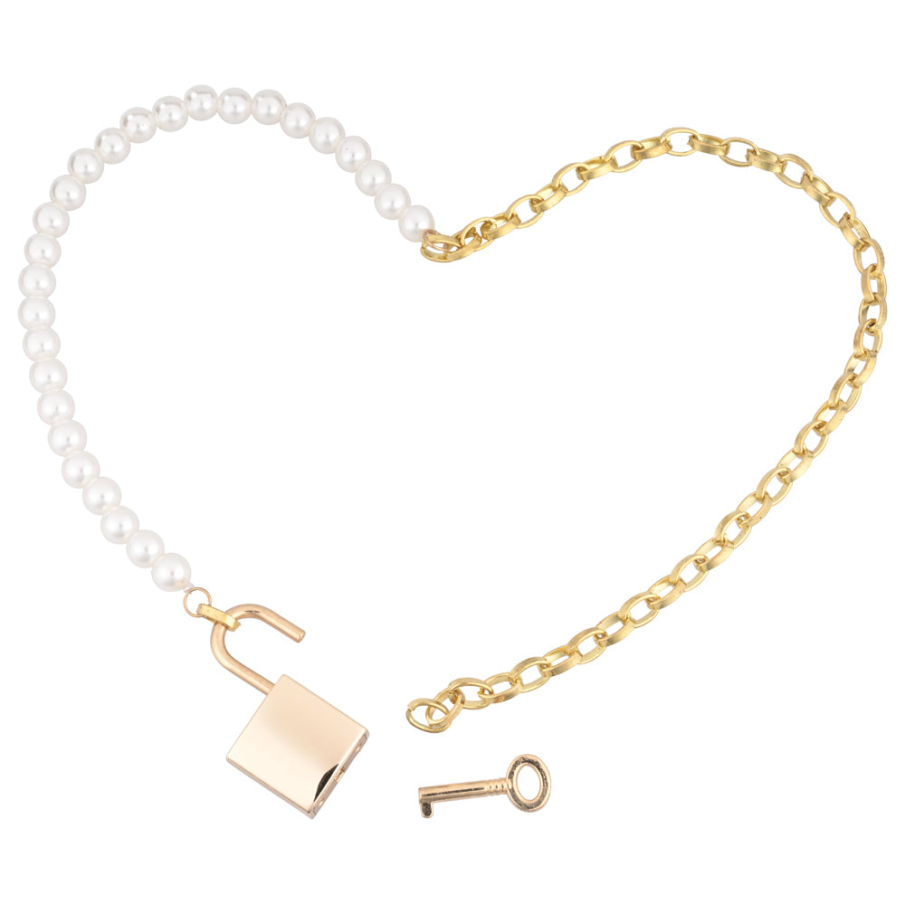 Gold and pearly day necklace on white background with lock and key. image 3