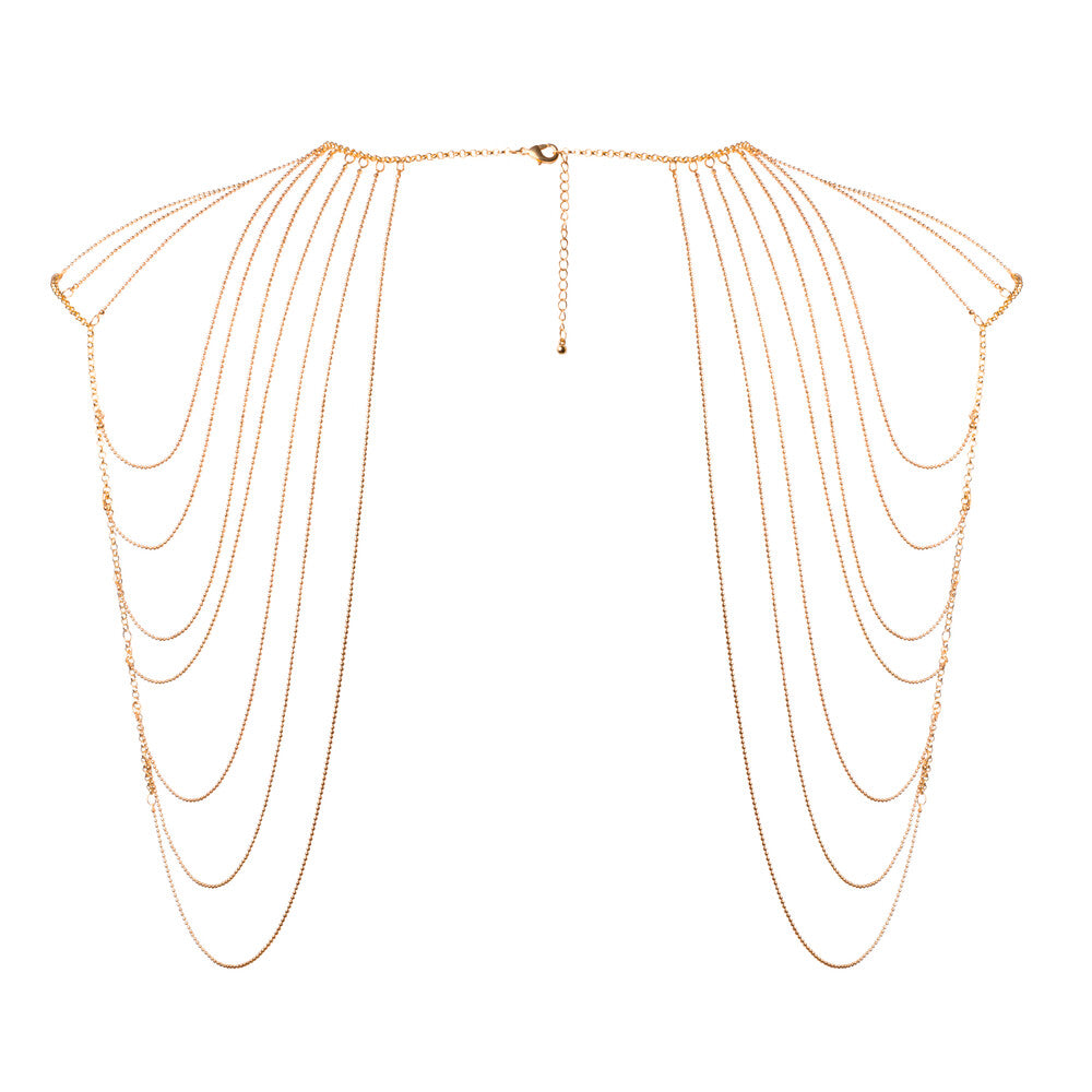 gold shoulder chains on background. image 2