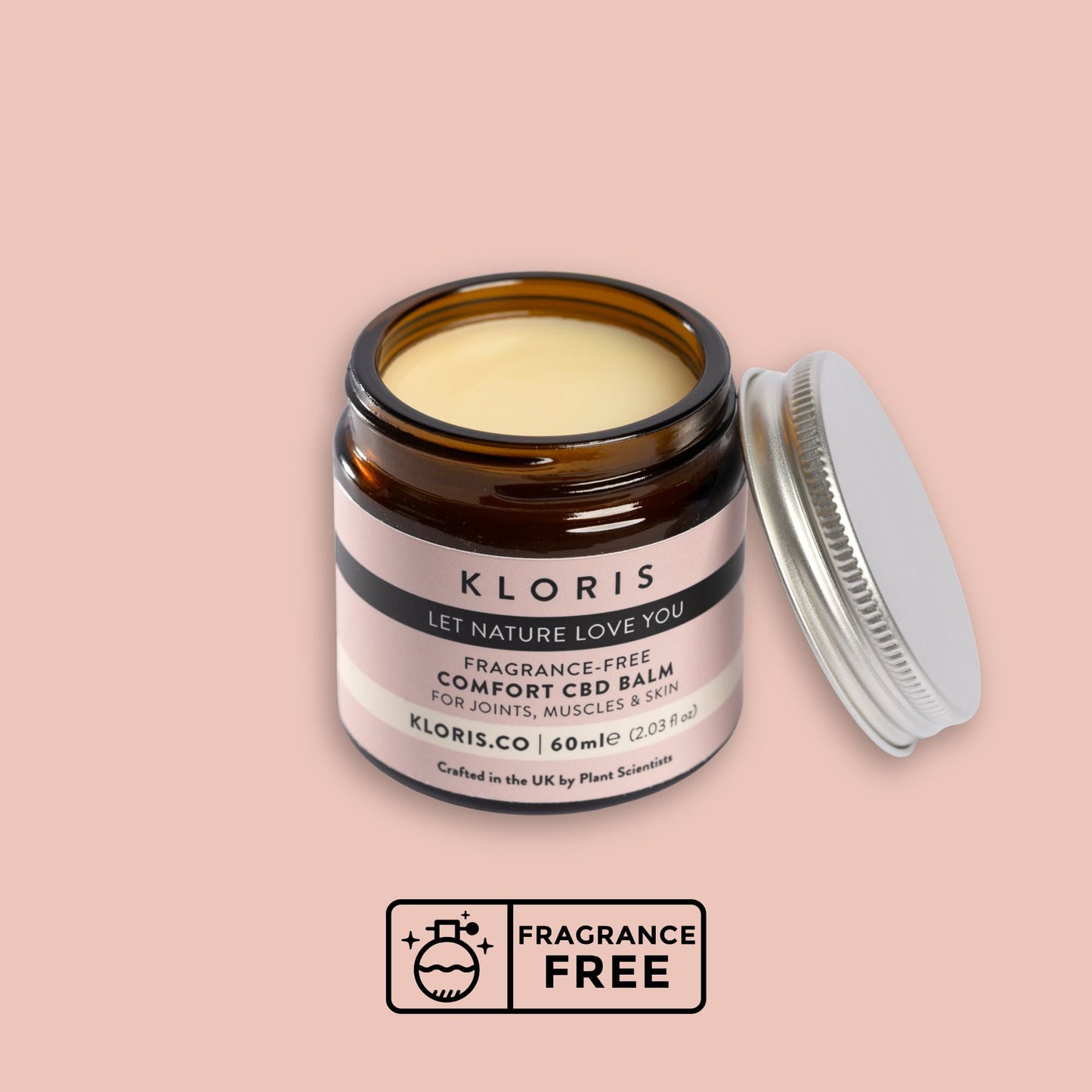 Kloris Comfort CBD Balm jar with open lid on a pink background