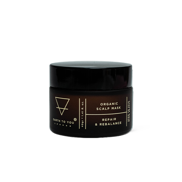 Black jar of organic scalp mask with branding on a white background