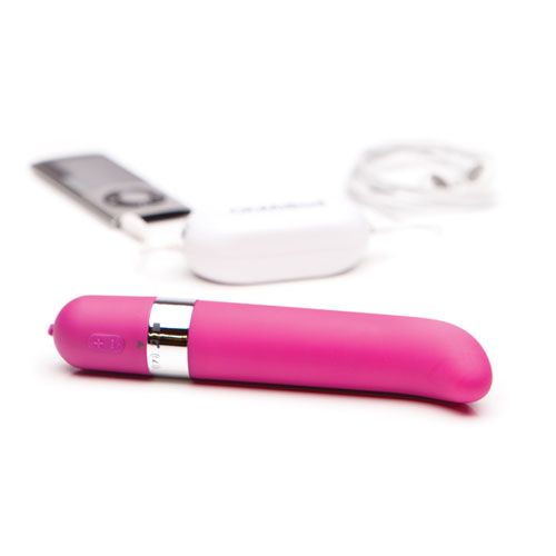 Pink Freestyle G Vibrator with charger on white background. image 2