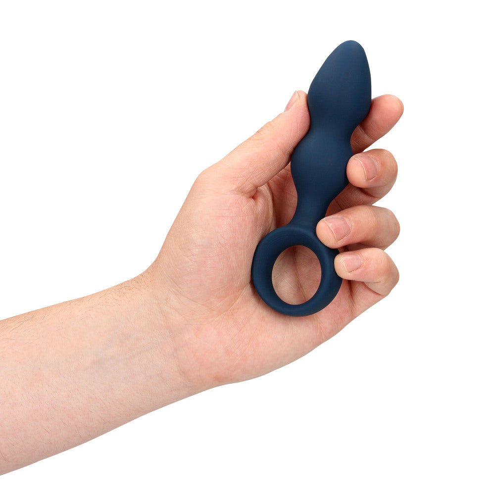 hand holding Sexplore Toy Kit for Him on white background. image 3