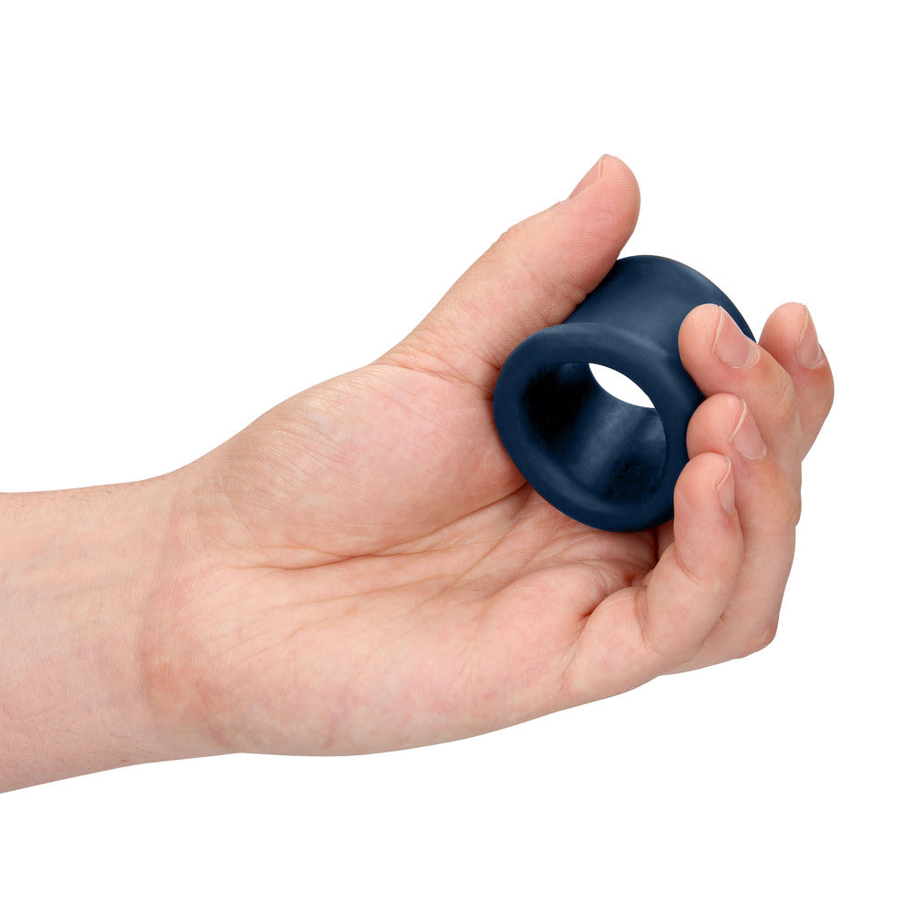 hand holding Sexplore Toy Kit for Him on white background. image 4