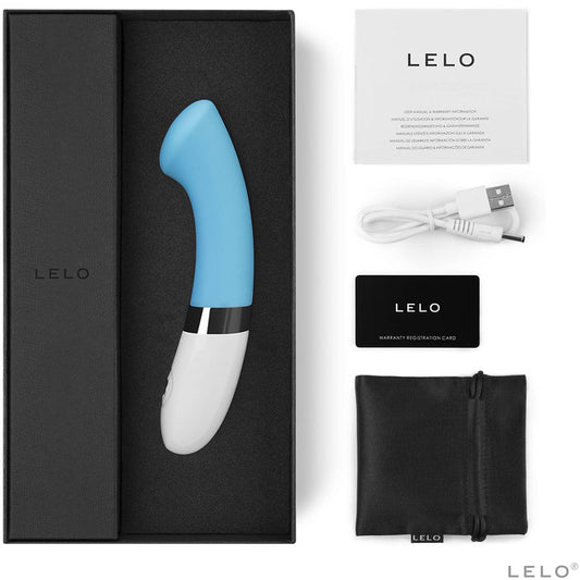Turquoise Blue G-Spot Vibrator with packaging and charger on white background. image 2