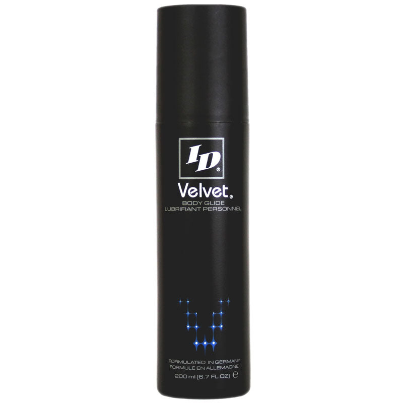 black bottle of ID velvet lubricant on white background. Image 1