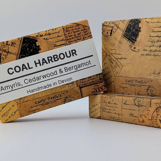 Two bars of Coal Harbour soap on a white background