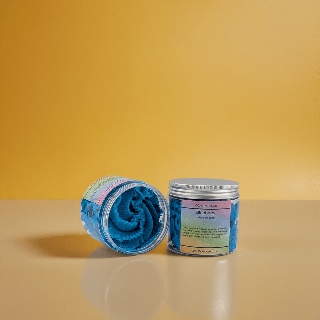 Two containers with blue rolled-up towels on a yellow background