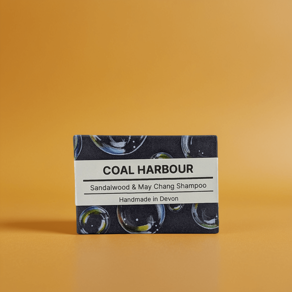 Bar of Coal Harbour Sandalwood & May Chang Shampoo on an orange background