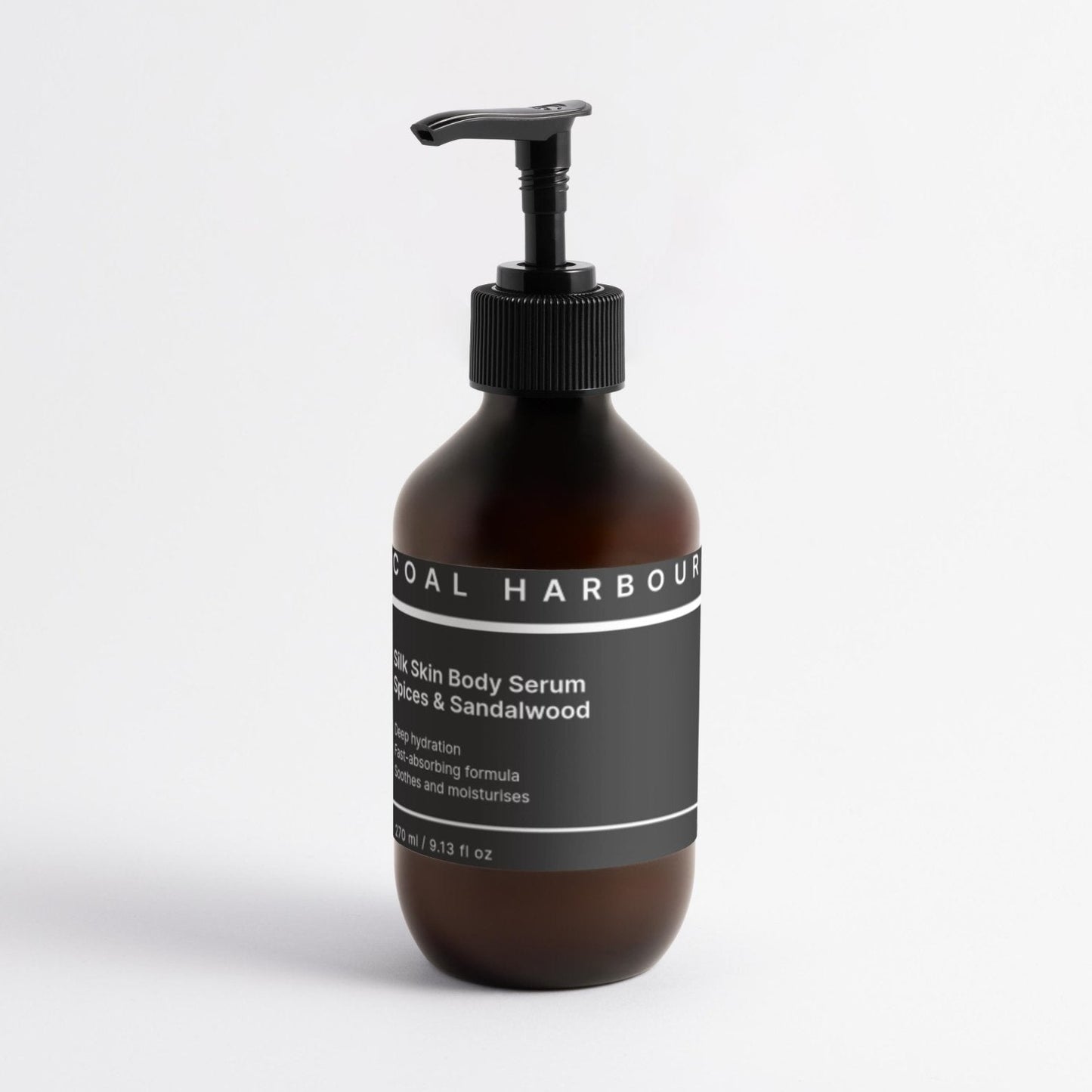 Brown bottle with black pump and label on a white background