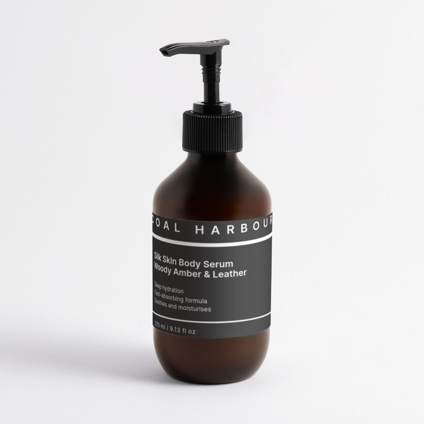 Brown bottle with black pump and label on a white background