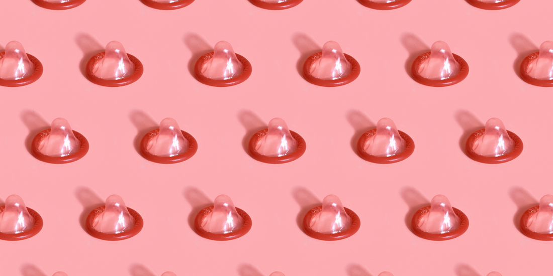 Lots of red condoms out of their packets.