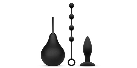 3 piece douche kit with plug, beads and douche on white background.