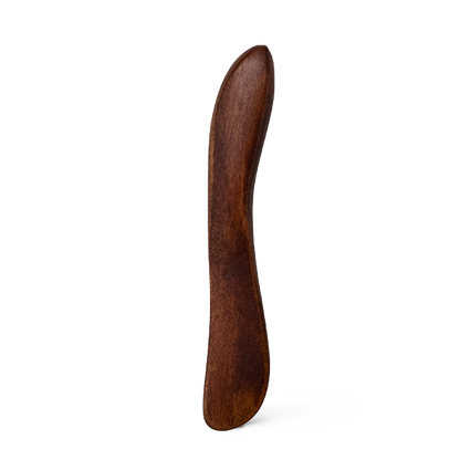 Wooden spatula on a white background