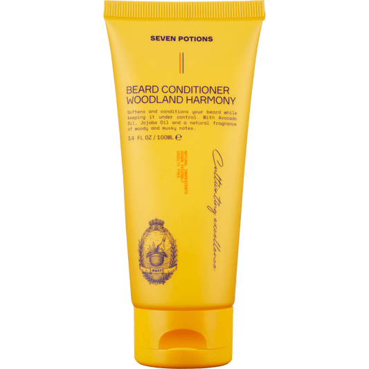 Yellow tube of Seven Potions Beard Conditioner on a black background