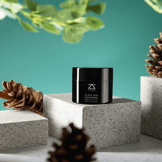 Moisturiser sitting on some stone with acorns and leaves