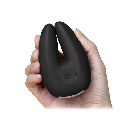 hand holding Black Rapture Twin Vibrator on white background. image 3