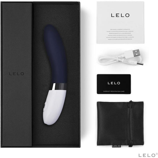 Blue G-Spot Vibrator  with packaging and charger on white background. image 2