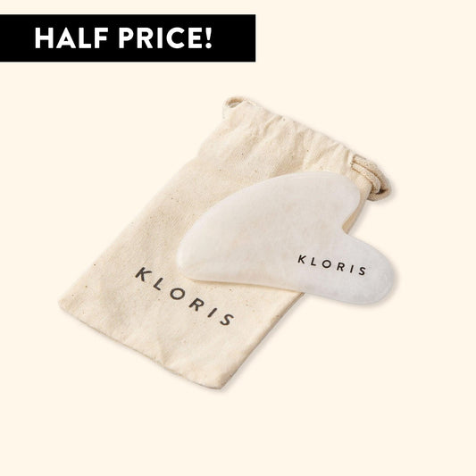 White Gua Sha tool with 'Kloris' branding on a beige drawstring bag, with 'HALF PRICE!' text above.