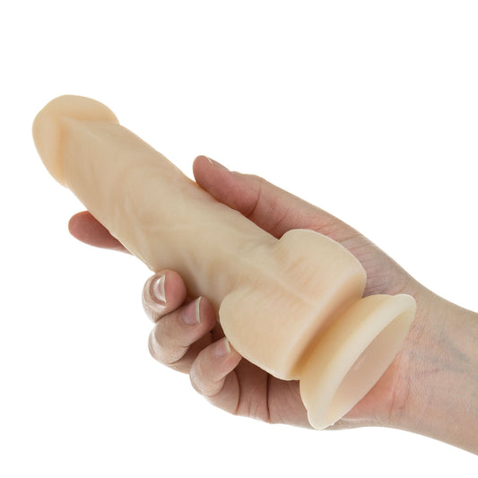 Flesh Rotating and Vibrating Dildo on white background. image 2