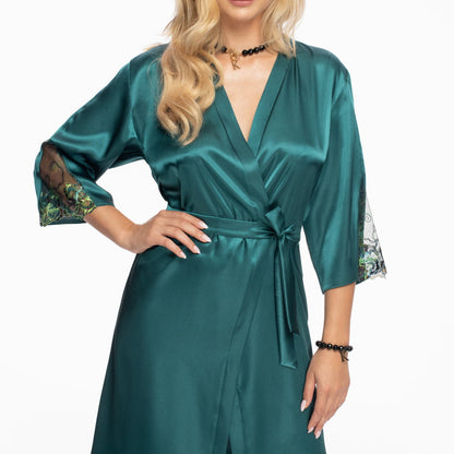 lady wearing a jade dressing gown on a white background.