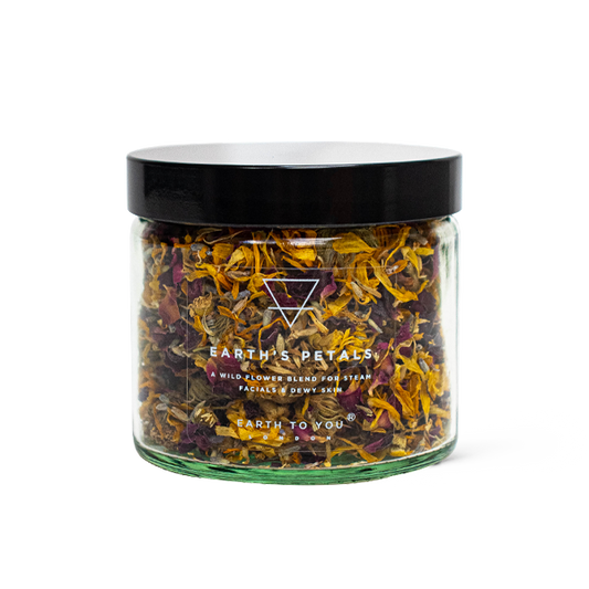 Jar of dried flowers with 'Earth's Petals' branding on a white background