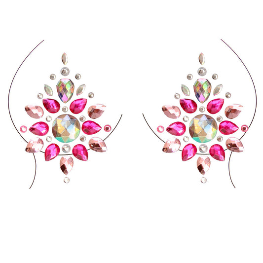 jewelled nipple stickers sat on a drawing of boobs on a white background. image 1