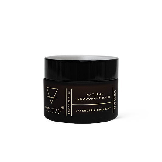 Black jar of natural deodorant balm with branding on a white background