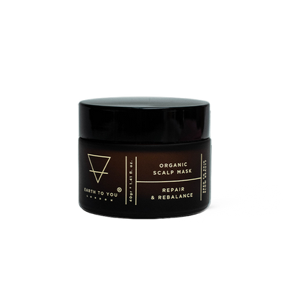Black jar of organic scalp mask with branding on a white background