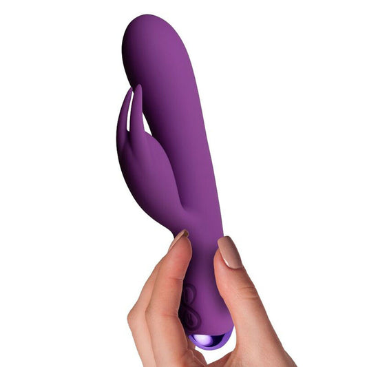 hand holding rocks off Purple Flutter Rabbit Vibrator on white background. image 2