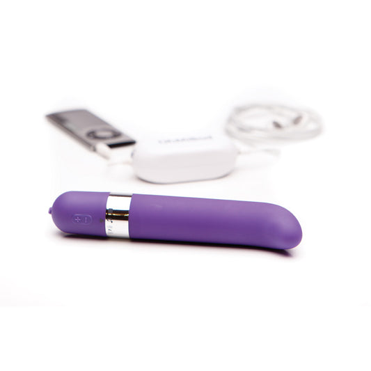 Purple FreeStyle G Vibrator with charger on white background. image 2