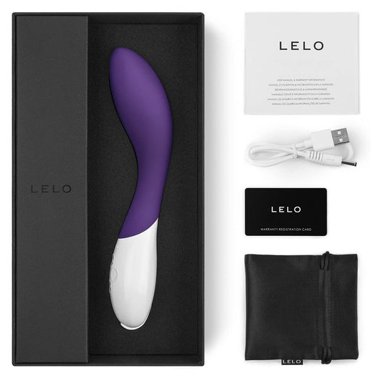 Purple G-Spot Massager with packaging and charger on white background. image 2