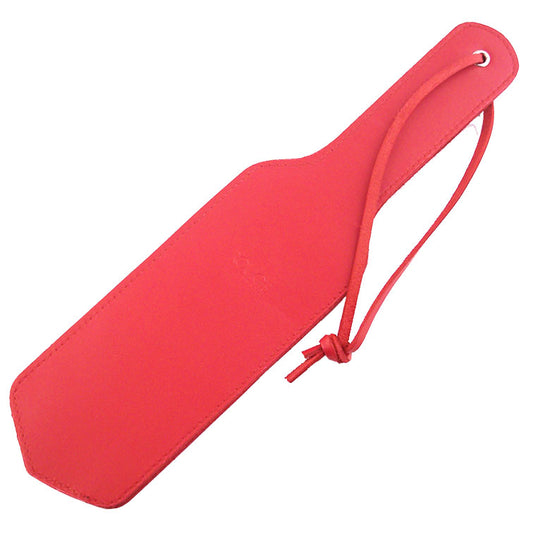 Red Leather Paddle on white background. image 1