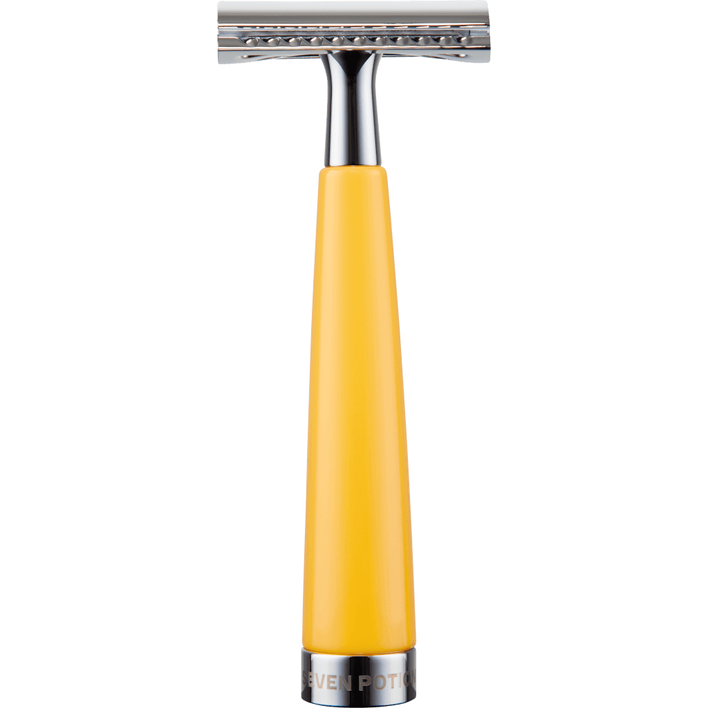 Shaving razor with yellow handle and silver metal parts on a black background