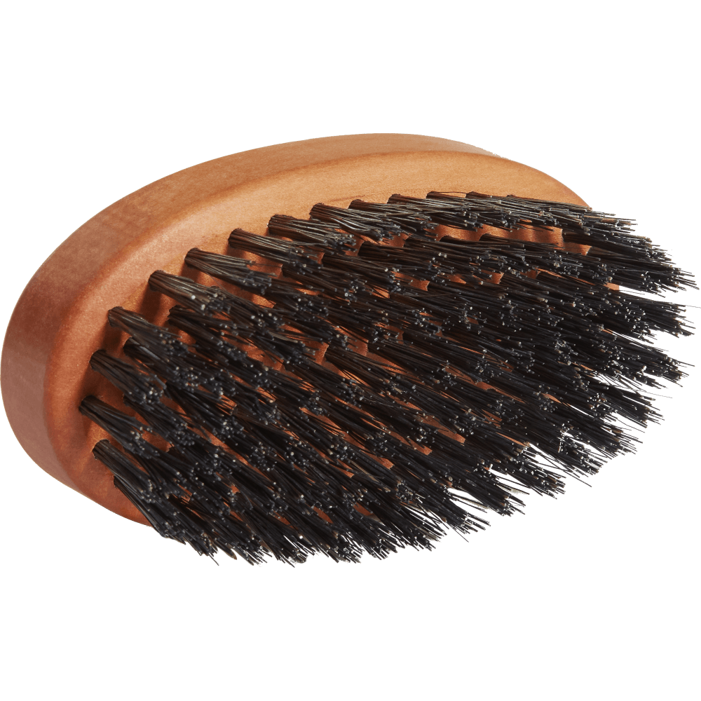 Wooden brush with black bristles on a transparent background