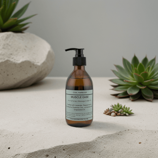 Bottle of 'Muscle Ease' on a concrete surface with succulents in the background