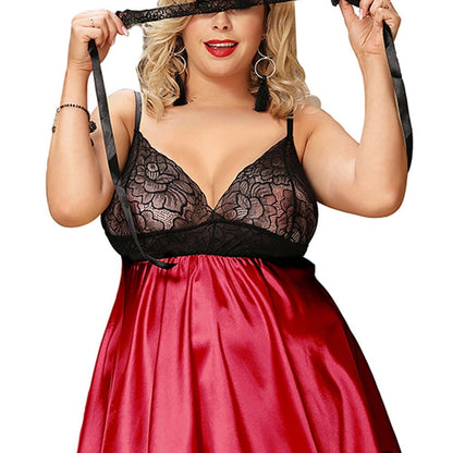 lady wearing black and red babydoll with blindfold on a white background.