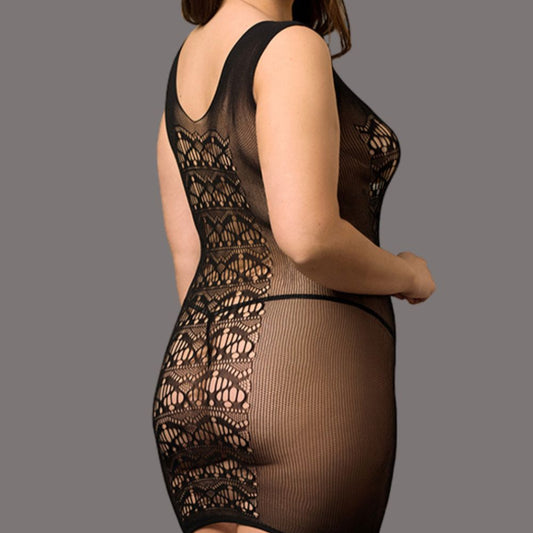 lady wearing black lace bodysuit and black pant on grey background, side view.