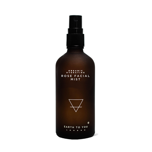 Brown bottle of Rose Facial Mist with 'Earth to You' branding on a white background