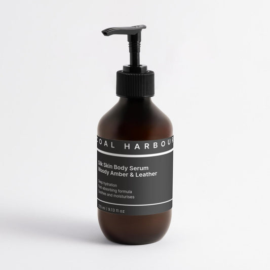 Brown bottle with black pump and label on a white background